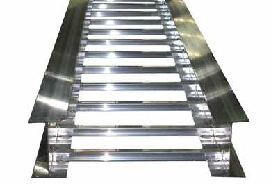 An aluminum ladder cable tray with I-beam channels and rungs